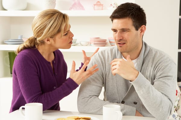 couple-arguing-at-kitchen-table_bzqmqn